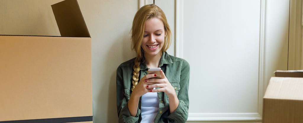 Young blonde woman updating personal information on her credit report