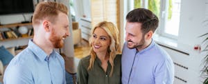 Real estate agent showing apartment to couple