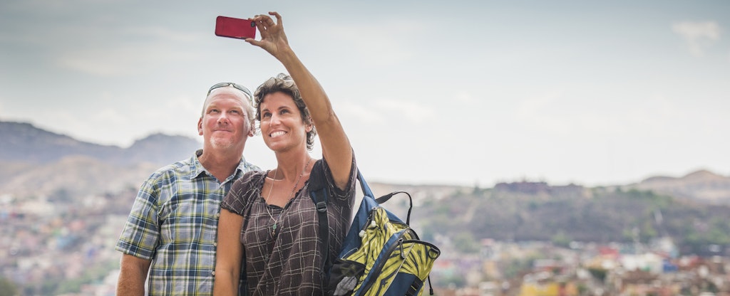 Couple snaps a selfie on their dream vacation