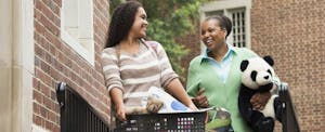 Mother and college-aged daughter benefitting from the American Opportunity Tax Credit (AOTC)