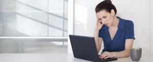 Woman researches tax lien online