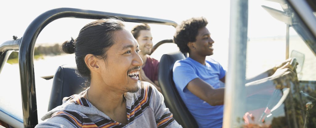 A group of male friends enjoying a road trip