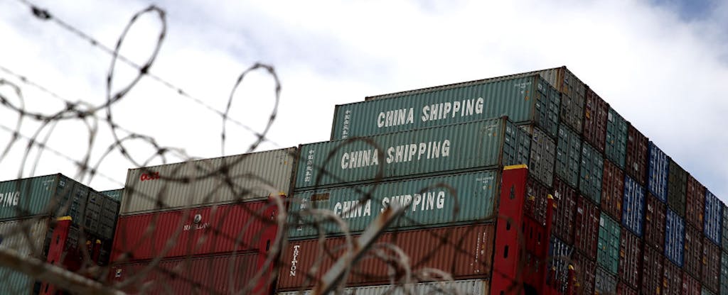 Shipping containers sit on the the Hong Kong–based CSCL East China Sea container ship at the Port of Oakland on June 20, 2018, in Oakland, California.