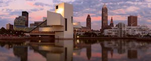 Rock and Roll Hall of Fame with Cleveland skyline in the background.