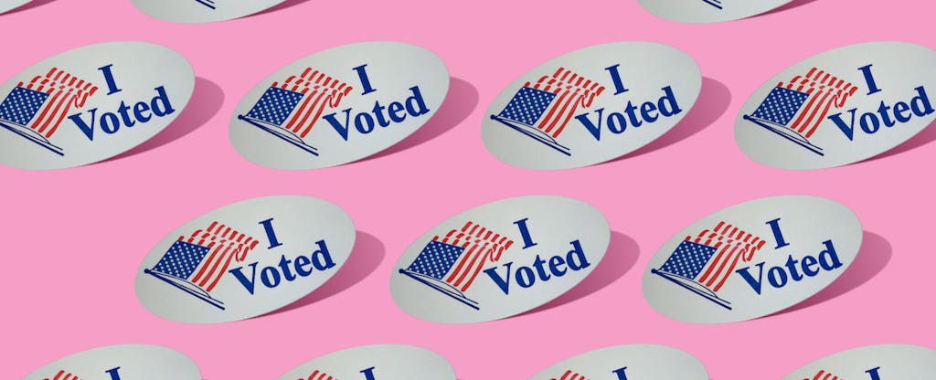 Rows of I Voted flag stickers on a pink background