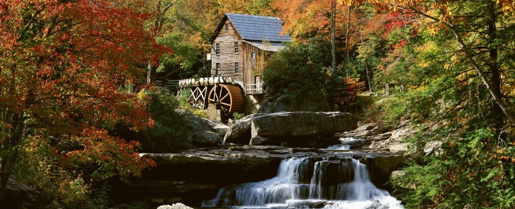 The historic and scenic Glade Creek Grist Mill in West Virginia is decked out in autumn colors.