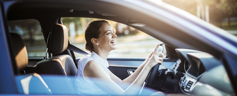 Businesswoman driving a car