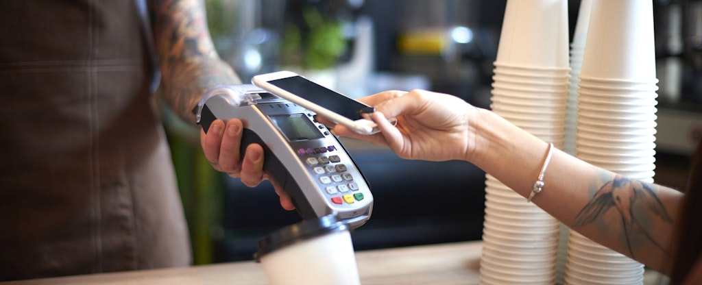 Customer making mobile payment with phone