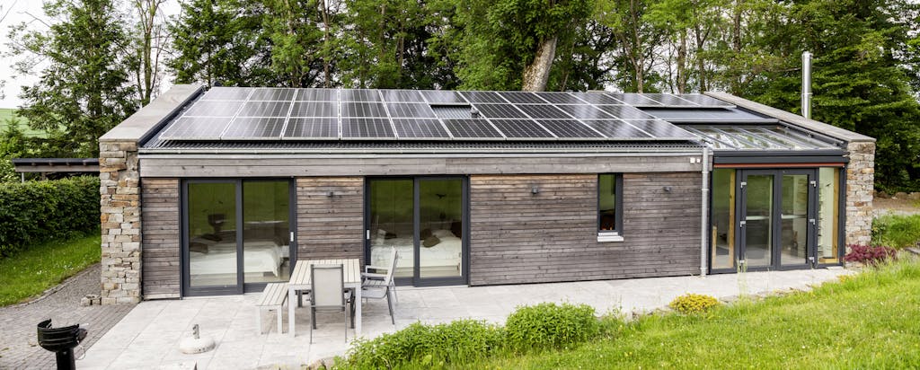 A home with solar panels on the roof.