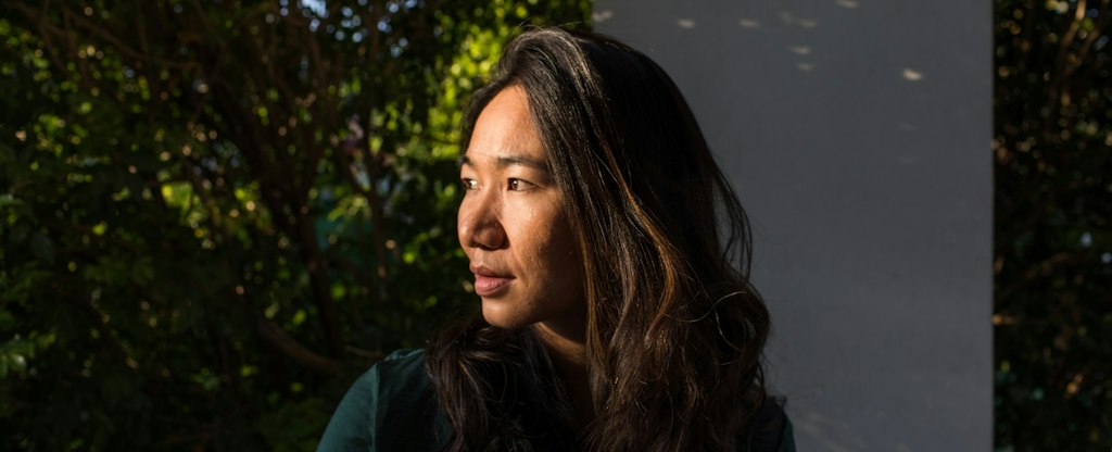 Woman looking thoughtfully to the side